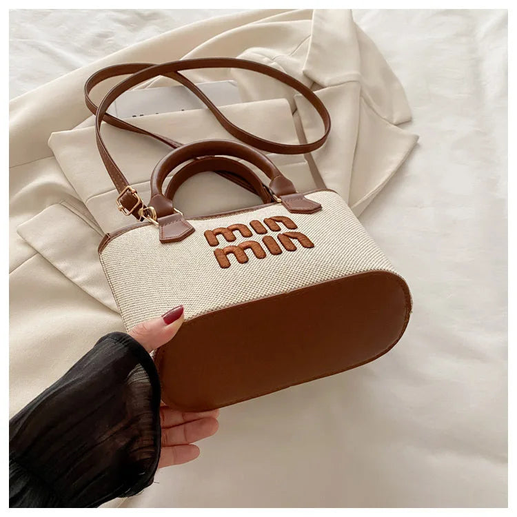 Signature mini satchel